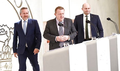 Danish PM adds two parties to government to steady support