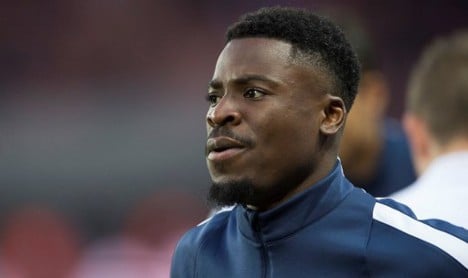 UK bars PSG's Aurier from travelling for Arsenal clash