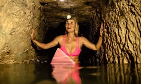 VIDEO: Bikini-clad American 'surfs' Paris catacombs