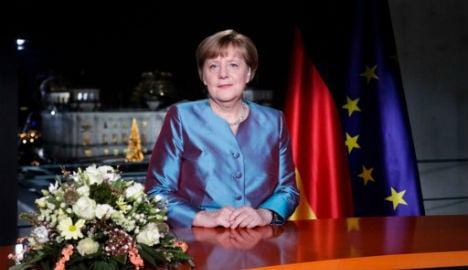 Merkel urges Germans to meet terror with freedom and openness