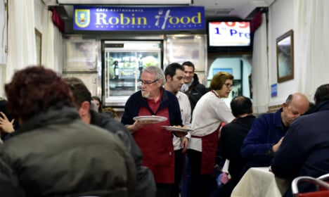 Madrid homeless dine out... for free