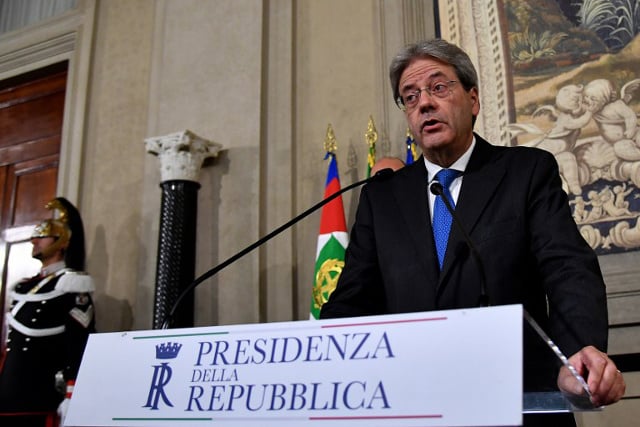 Italy's new PM Gentiloni races to form new cabinet