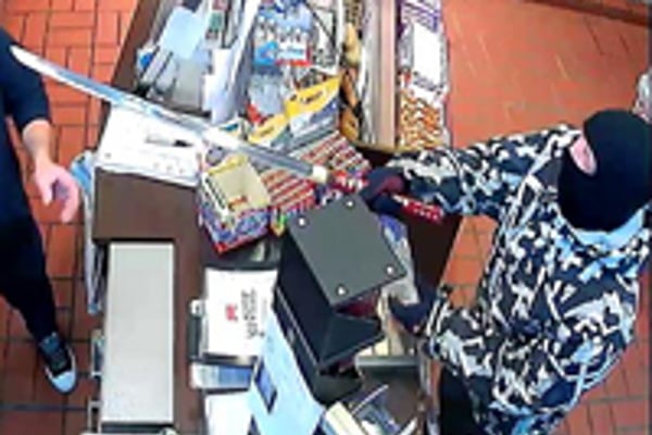 VIDEO: Police search for thief who robbed petrol station with 'samurai sword'
