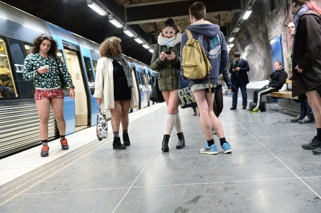 In pictures: Swedes celebrate 'no pants' subway ride in freezing cold
