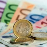 How will Germany spend its €6 billion surplus?