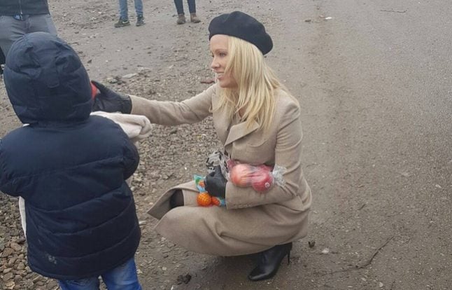 Marine Le Pen turned away from migrant camp in France... but Pamela Anderson is welcomed