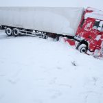 Snow and ice on Mecklenburg-Western Pomerania motorways caused this truck to slide off into a ditch; one of many accidents across German roads.Photo: DPA
