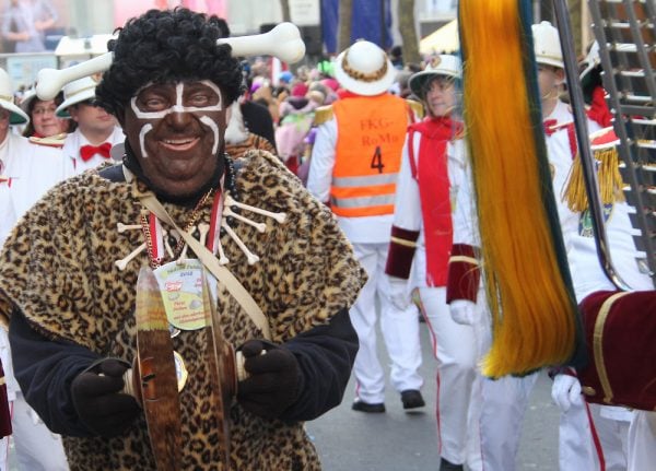 Carnival troop who 'black up' get police escort after racism row