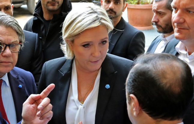 Le Pen accused of 'improper behaviour' for refusing headscarf to meet Muslim leader