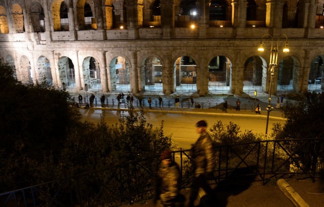 Tourist charged after carving name into Colosseum