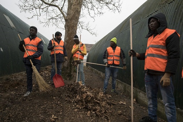 How Italy is getting asylum seekers to help out in their new communities