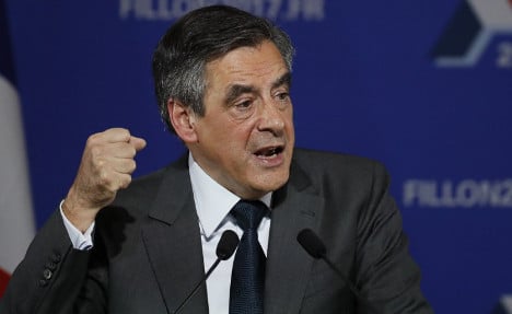 France's Fillon vows to run even if charged over 'fake jobs' row
