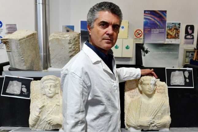 Two statues rescued from Isis are back in Syria after Italy restoration