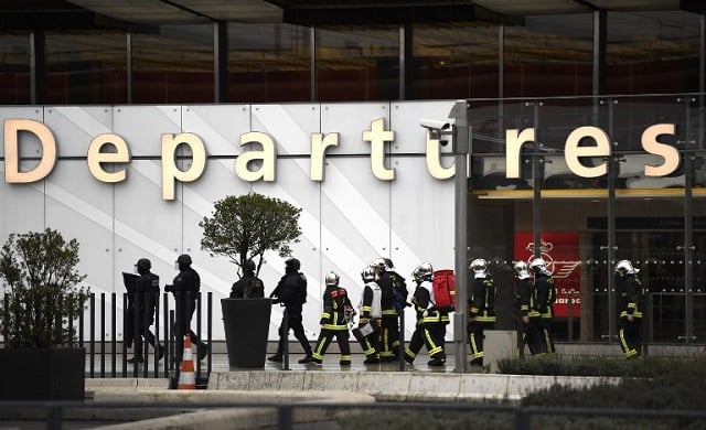 Flights resume at Orly airport as investigators question attacker's family