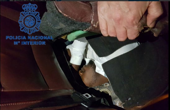 Spanish police find migrants squeezed into dashboard and under car seat