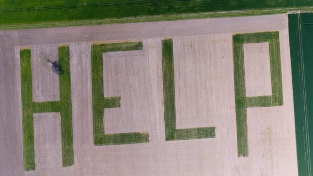 French farmer transforms wheat field into gigantic 'HELP' plea to candidates