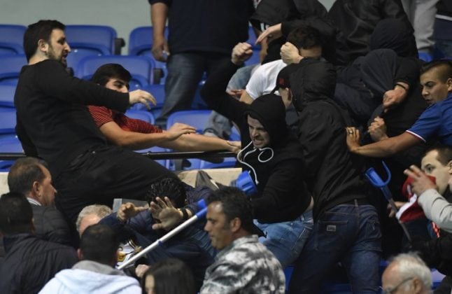 Football: Violence in the stands and a pitch invasion mar Lyon vs Besiktas match