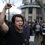 Clashes as thousands march in Paris over police killing of Chinese man