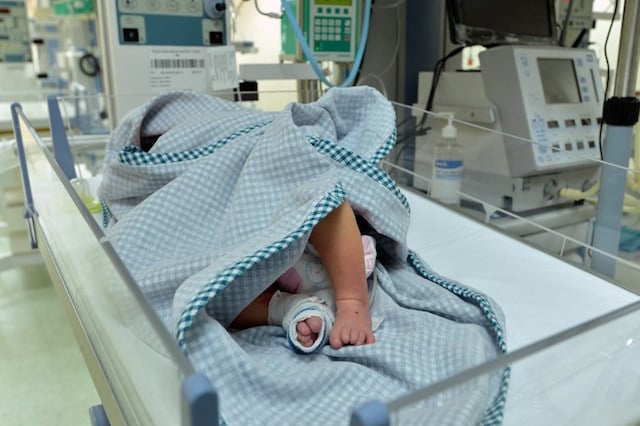 Italian woman returns mixed-race baby to surrogate