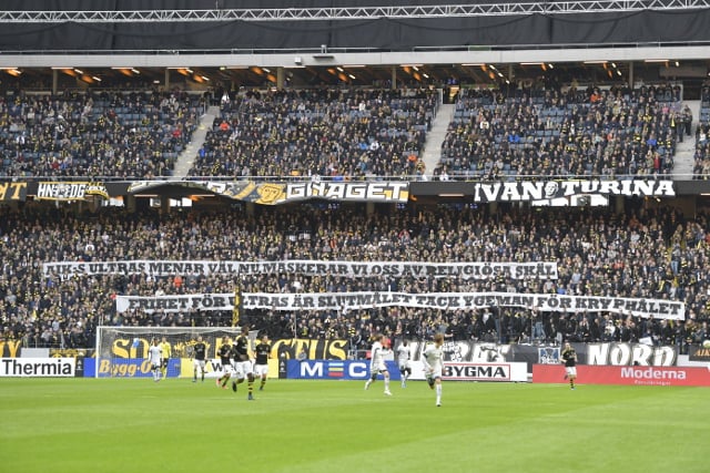 Swedish football fans protest mask ban by wearing niqabs