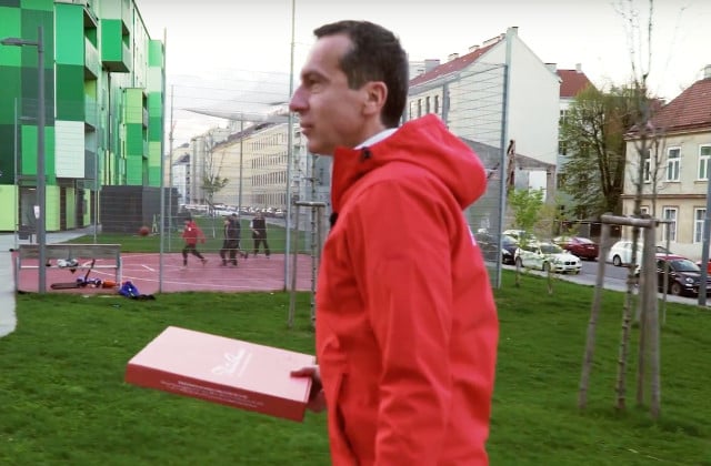 VIDEO: Austria's chancellor delivers pizzas... but critics aren't buying it