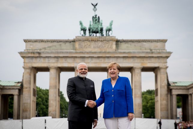 Indian PM Modi praises Merkel's 'vision', urges climate action