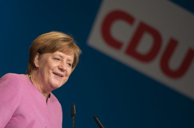 Strong win in state poll boosts Merkel's party ahead of national vote