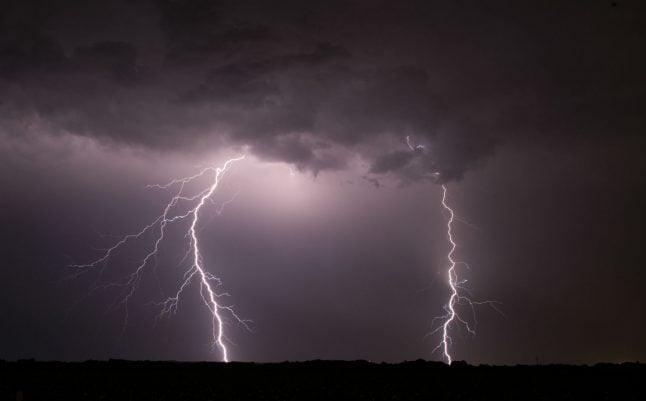 Woman killed by lightning strike while cycling in west Germany