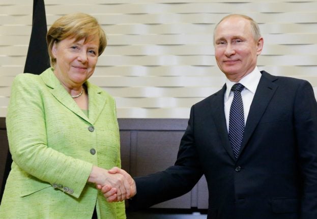 Merkel rebukes Putin on gay rights in frosty Sochi meet