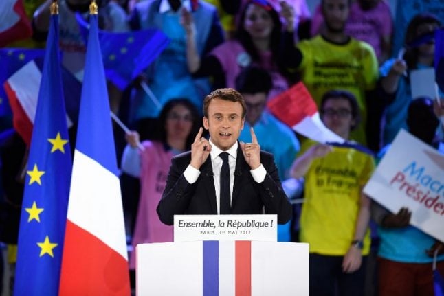 Macron wins majority in French parliament but record abstention mars election