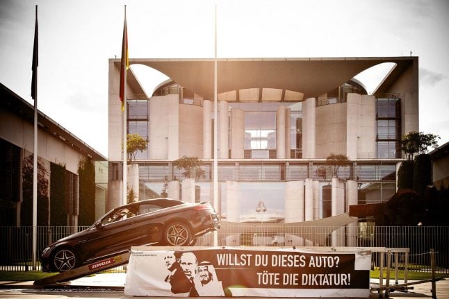 Turkey condemns Berlin 'kill dictatorship' artwork featuring Erdogan