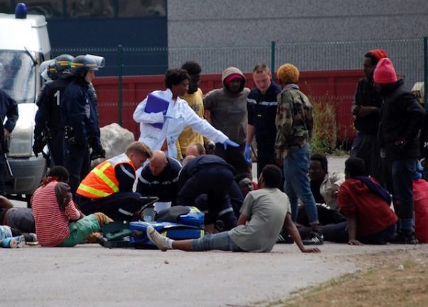 Police break up clashes between African migrants in Calais