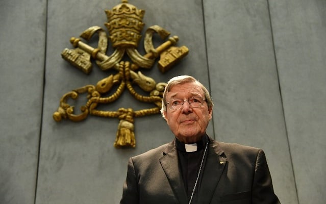 Cardinal Pell returns to Australia to face sex abuse charges