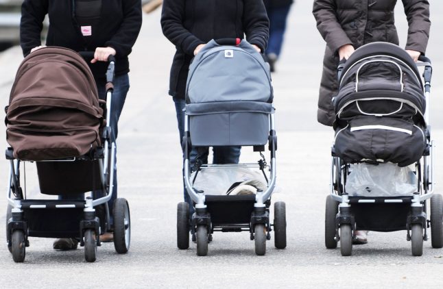 Fight among mothers over baby buggies leaves three police officers injured