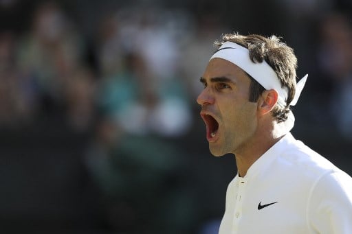 Federer eases into Wimbledon semifinals as top seeds crash out