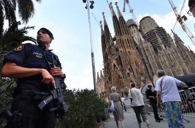 Spain attack fugitive whereabouts unknown as Barcelona mourns