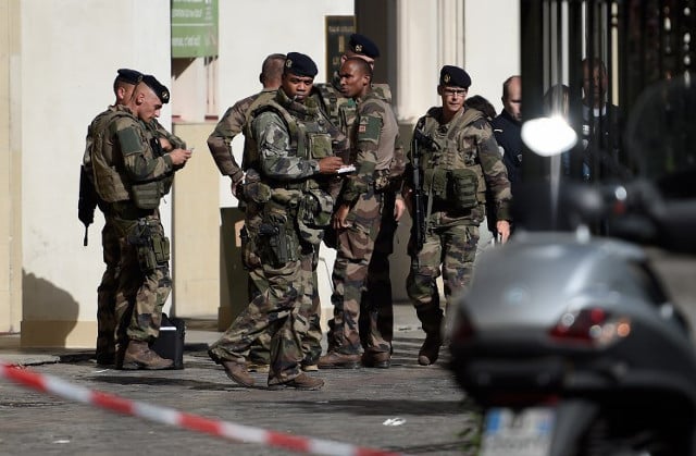 Man charged for ramming soldiers in Paris suburbs