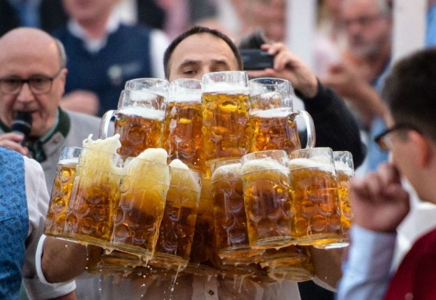 Bavarian smashes world record by carrying 70kg of beer at historic festival