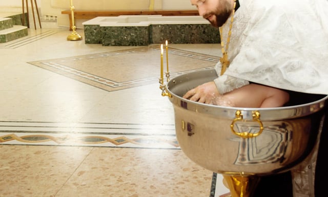French pranksters replace holy water with alcohol