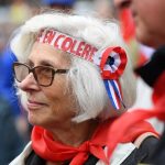 Angry French pensioners march against Macron