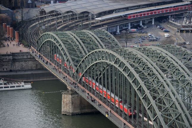 Hours of train delays in Cologne after asylum seeker protests on busy bridge