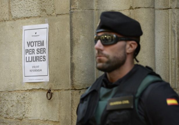 Spain seizes Catalan referendum posters and summons mayors