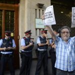 Spain police search Catalan govt headquarters amid referendum row