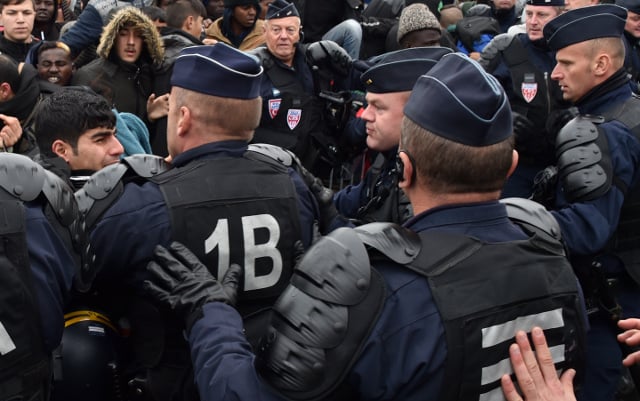 Beleaguered French riot cops booked in same hotel as migrants they evicted