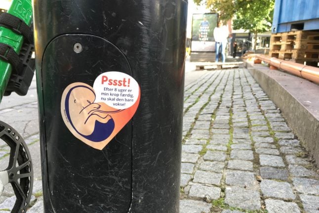 Aarhus orders anti-abortion group to remove stickers from city