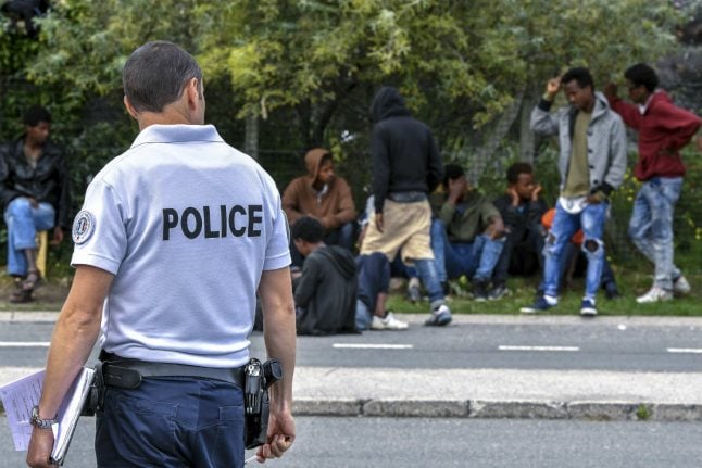 French police clash with migrants in Calais