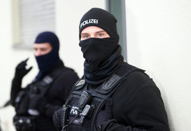 Alleged Islamist arrested as police seize large arms stock in Berlin raids