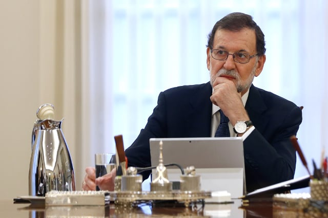 Spanish PM Rajoy asks Catalan government to 'clarify' if it declared independence