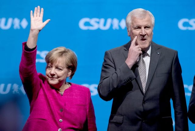 Refugee issue looms as Merkel starts coalition talks