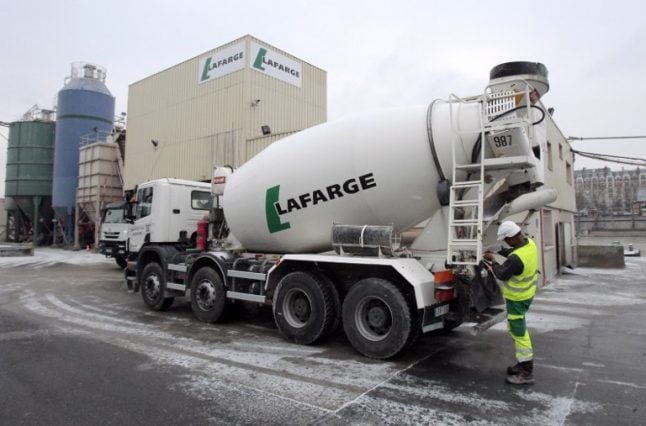 Paris: Petrol containers and 'crude' detonator found under cement trucks